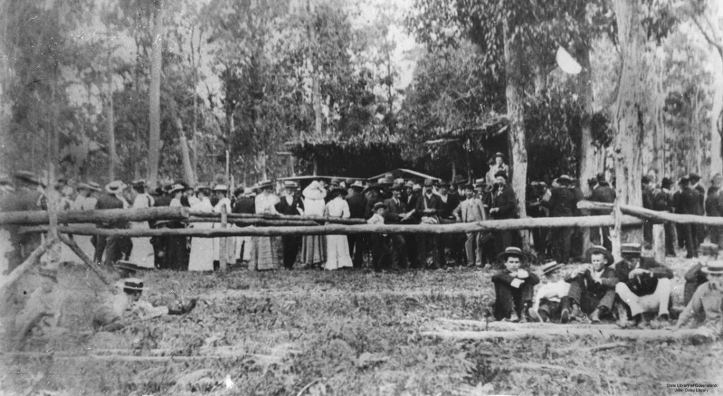 909 - A typical gathering at a race meeting the Yandina Racecourse.